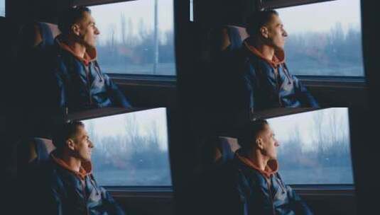 男人坐火车望着窗外高清在线视频素材下载