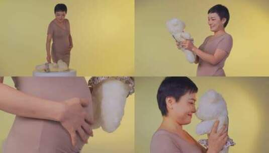 怀孕准妈妈大肚子毛绒玩具熊高清在线视频素材下载