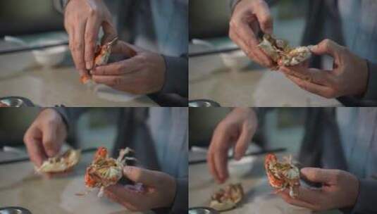 中年男子吃螃蟹高清在线视频素材下载