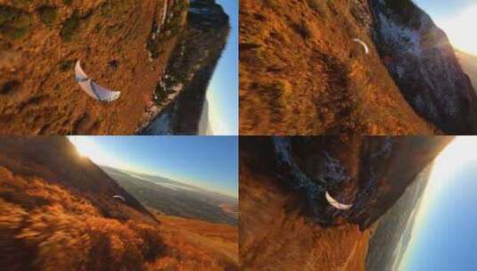 FPV无人机航拍动力滑翔伞飞行日出森林高山高清在线视频素材下载