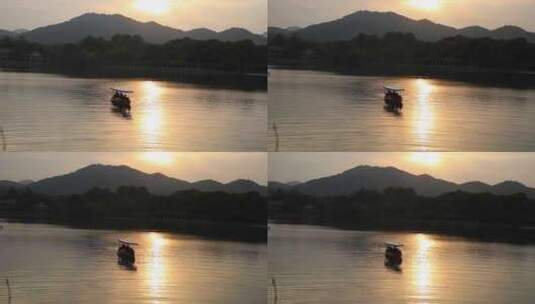小船游览夕阳西下杭州西湖高清在线视频素材下载