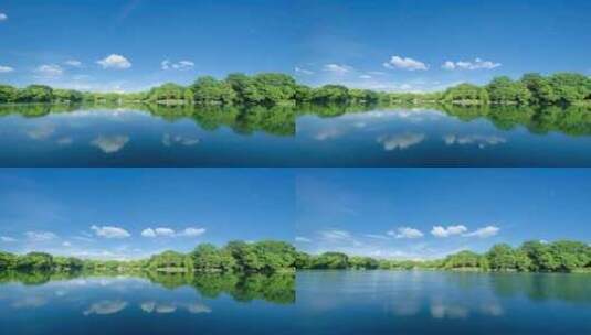 桂林两江四湖树林湖面倒影天空之镜延时高清在线视频素材下载