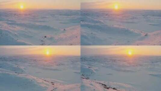 冬天雪地和温暖的日出高清在线视频素材下载