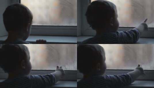 透过迷雾的窗户看的小男孩高清在线视频素材下载