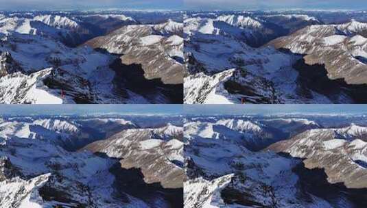 航拍四川岷山山脉雪宝顶雪山山脊上的登山队高清在线视频素材下载