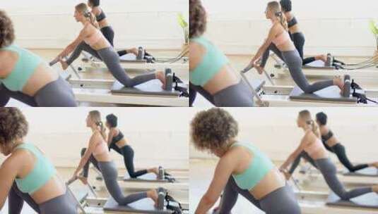 女性在改革者的健身室进行普拉提锻炼高清在线视频素材下载