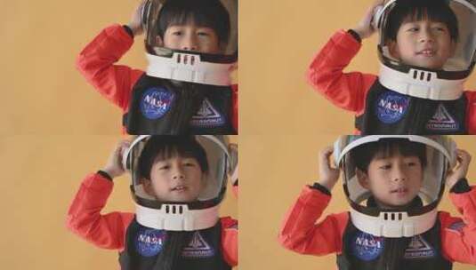 男孩戴着太空头盔高清在线视频素材下载