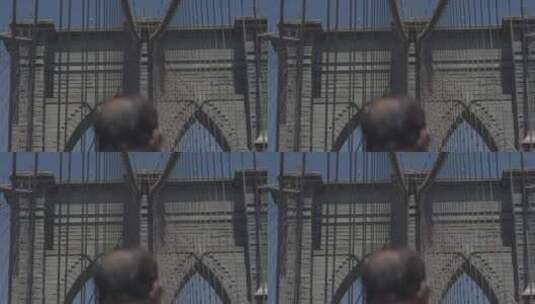 老人行走在吊桥上高清在线视频素材下载
