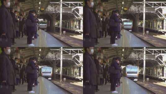 通勤者在站台上等待火车高清在线视频素材下载