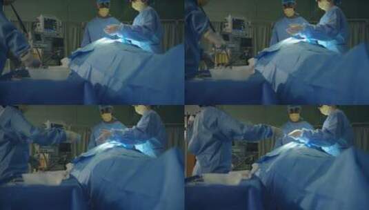 助手将手术刀给医生高清在线视频素材下载