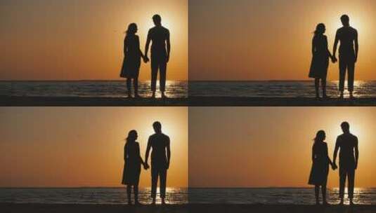 情侣站在海边的剪影高清在线视频素材下载