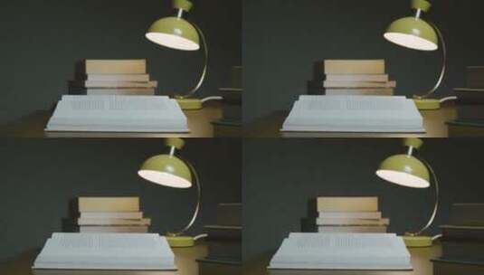 桌子上的台灯和书籍的特写镜头高清在线视频素材下载