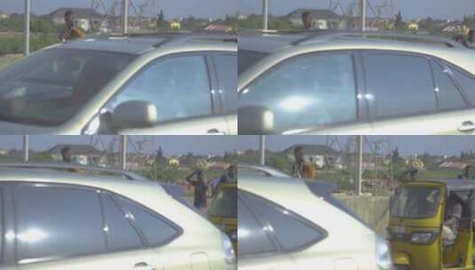 尼日利亚城市街道上的车辆和行人高清在线视频素材下载