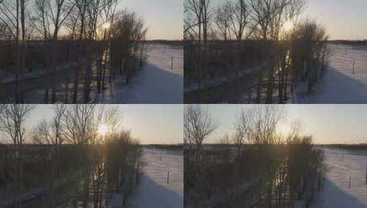 雪地公路迎着夕阳孤独行驶航拍高清在线视频素材下载