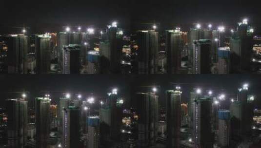 建筑工地楼盘夜景航拍建设中楼盘高清在线视频素材下载