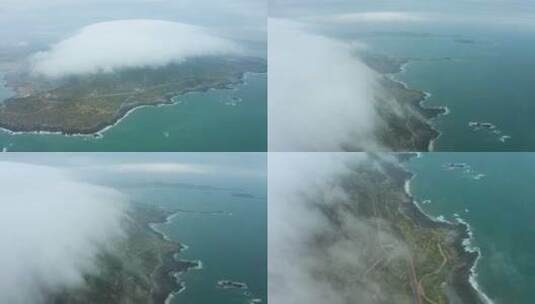 俯瞰岛屿 蘑菇云云层之上 航拍4K高清在线视频素材下载