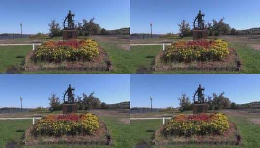雕像和鲜花景观高清在线视频素材下载