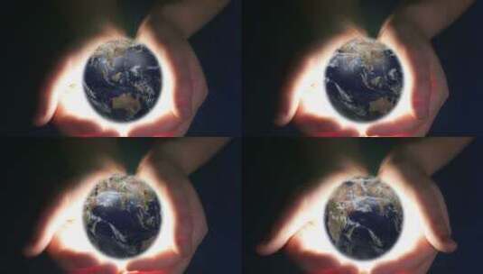 地球环境保护日男孩双手握着地球希望高清在线视频素材下载