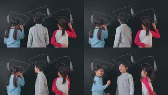 小学生们在黑板上画博士帽高清在线视频素材下载
