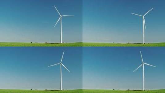 蓝天下的风力发电设备高清在线视频素材下载