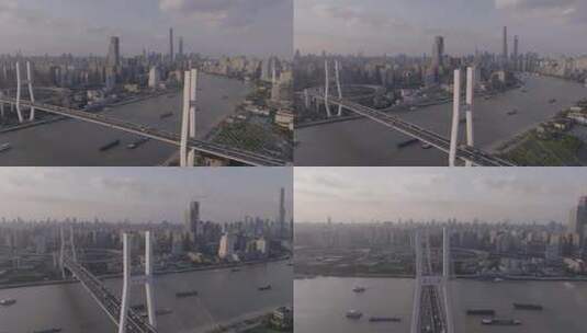 上海南浦大桥远景陆家嘴上海中心城市航拍4K高清在线视频素材下载