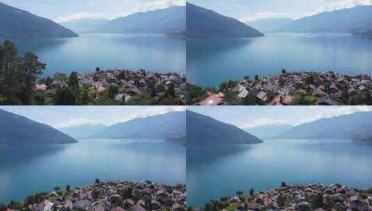 航拍湖边的村庄高清在线视频素材下载