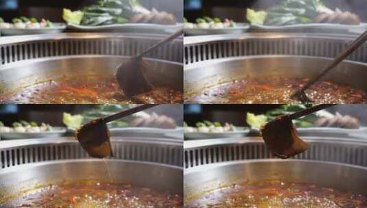 冬季火锅从火锅里夹起涮肉高清在线视频素材下载