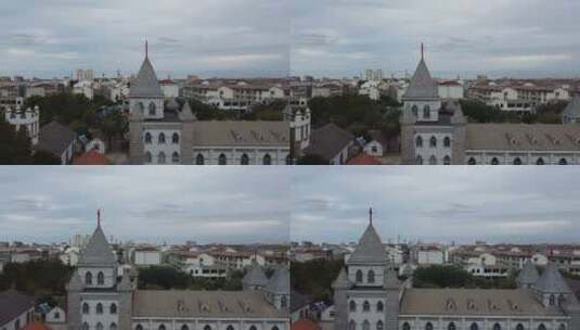 航拍山东蓬莱沿海城市教堂城镇风光高清在线视频素材下载