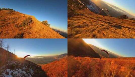 FPV无人机航拍动力滑翔伞飞行日出森林高山高清在线视频素材下载