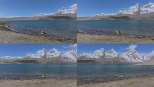 航拍男子在西藏定结宗措湖畔高清在线视频素材下载