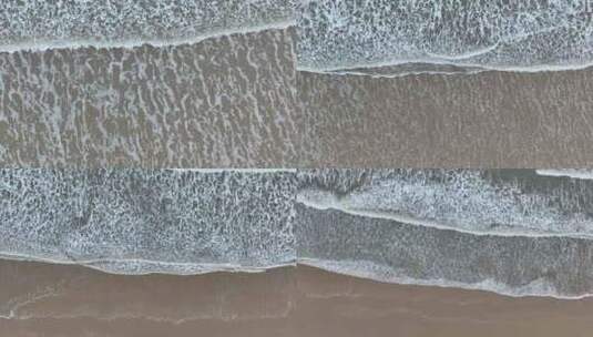 俯拍大海阴天大海航拍海洋海水海岸线海滩高清在线视频素材下载