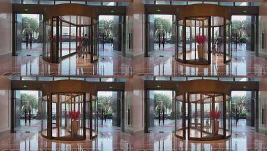 现代建筑酒店旋转门入口高清在线视频素材下载