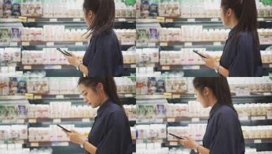 年轻女性现代商超购物逛超市高清在线视频素材下载