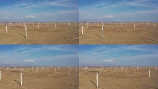 鸟瞰秋天蓝天下的新疆五彩滩风电场航拍高清在线视频素材下载