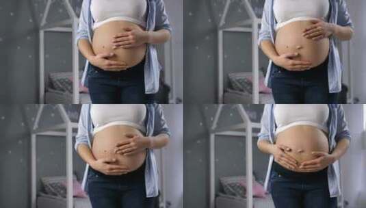 孕妇抱着肚子高清在线视频素材下载