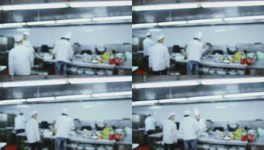 餐厅厨房的厨师忙碌模糊的身影后厨准备食材高清在线视频素材下载