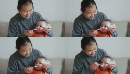 奶奶喂小宝宝吃饭小婴儿成长高清在线视频素材下载