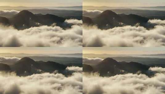 黄昏云雾缭绕的山脉云层景观高清在线视频素材下载