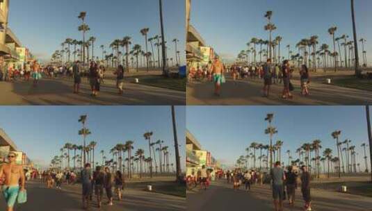 黄昏威尼斯海滩上来往的游客高清在线视频素材下载