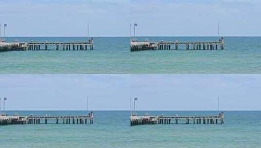 墨尔本海边木栈道垂钓码头海面高清在线视频素材下载