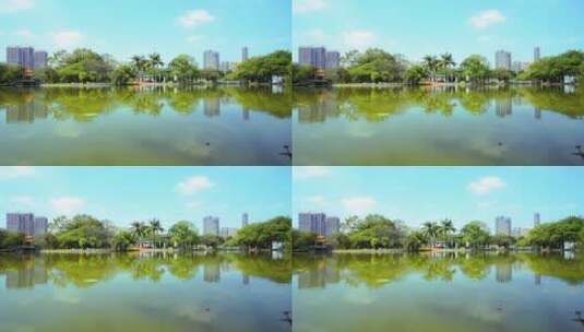 深圳洪湖公园水倒影树木城市建筑B高清在线视频素材下载