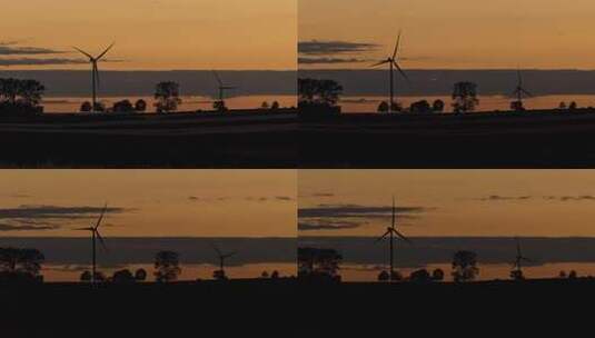 夕阳中的风力发电高清在线视频素材下载
