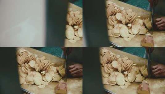 北京护国寺小吃街土豆片制作高清在线视频素材下载