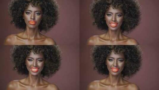 裸露肩膀的华丽非裔美国时装模特的美丽肖像高清在线视频素材下载