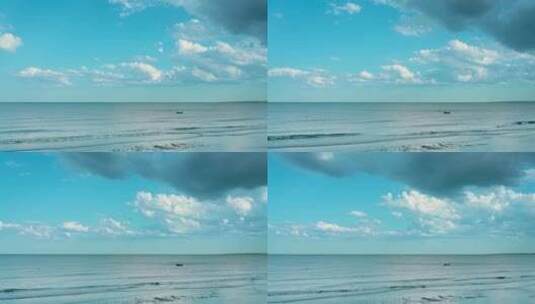 沙滩上的海浪在阳光下冲洗软沙高清在线视频素材下载