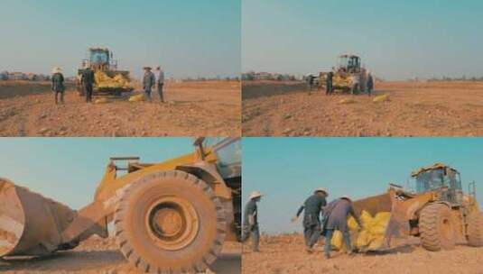 乡村振兴农业农田装载机投撒有机肥特写高清在线视频素材下载