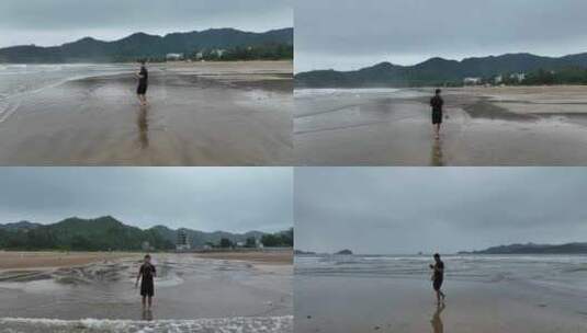 台风天高罗海滩游玩高清在线视频素材下载
