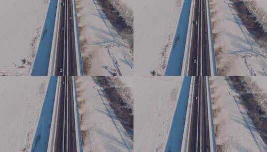 无人机航拍 俯拍鸟瞰汽车行驶在雪后的公路3高清在线视频素材下载
