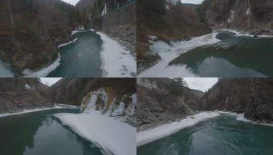 fpv穿越机在阿坝州冰封河流穿梭高清在线视频素材下载