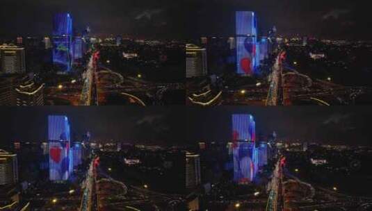 海南海口海滨新城城市车水马龙夜景灯光航拍高清在线视频素材下载